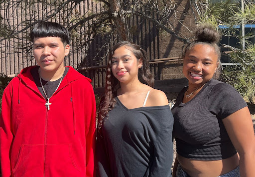 Three ColoREADo student ambassadors standing together outdoors